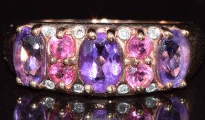 A 9ct rose gold ring set with amethysts, tourmaline and diamonds, 3g, size N