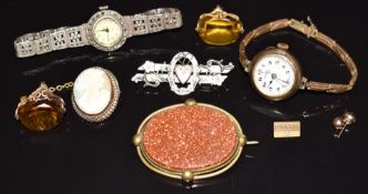 A silver watch set with marcasite, silver brooch Birmingham 1899, swivel fobs, 9ct gold singer