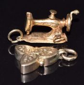 Victorian yellow metal charm and a 9ct gold charm in the form of a sewing machine 2.1g
