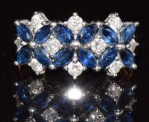 An 18ct gold ring set with diamonds and sapphires, bespoke made in Gibraltar by Don Lal in 2005,