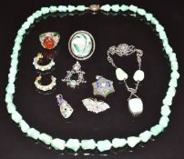 Chinese pendant set with a jade and sapphire cabochon, turquoise necklace with silver filigree