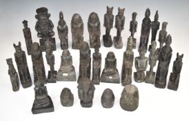 Twenty nine Egyptian basalt figures, height of tallest 20cm