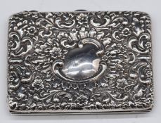 Victorian or Edward VII hallmarked silver evening wallet or purse with embossed decoration, the