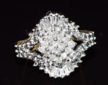 A 9ct gold ring set with baguette and round cut diamonds, 2.6g