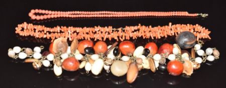 Two coral necklaces and a seed necklace