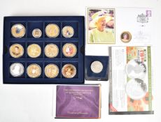 A collection of gold plated photographic commemorative coins Westminster, Bradford Exchange etc,