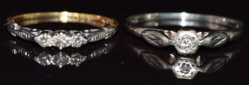 An 18ct gold ring set with diamonds in a platinum setting and a 9ct white gold ring set with a