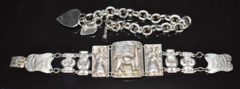 A silver curb link bracelet and a silver Industria Peruana figural bracelet, 90g