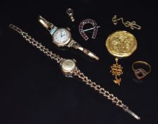 Two 9ct gold watches (22g), garnet horseshoe brooch, garnet ring, 9ct gold clip (1.9g) and yellow