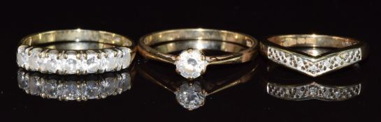 Two 9ct gold rings set with cubic zirconia and a 9ct gold ring set with diamonds, 5g