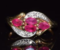 A 9ct gold ring set with rubies and diamonds, 2.2g, size J