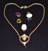 Silver gilt heart pendant set with garnets on rope twist necklace, Victorian hardstone fob, a