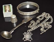 A silver Albert, Chester 1912, silver bangle, silver spoon and two silver thimbles