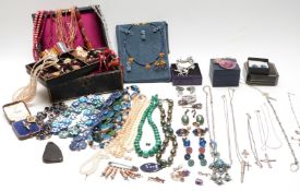 A collection of jewellery including silver chains, a pair of 14k gold earrings, malachite