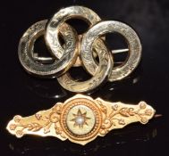 A 15ct gold brooch set with a pearl, verso a glass compartment, Chester 1900, 2.8g and a Victorian