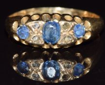 An 18ct gold ring set with sapphires and diamonds, Chester 1919, 3g, size N