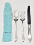 Two Tiffany & Co. sterling silver forks, length 15.5cm, and similar knife, weight of forks 72g, in