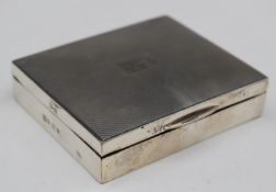 Elizabeth II hallmarked silver cigarette box, with engine turned lid, Birmingham 1954, maker William