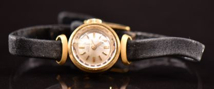 Girard Perregaux 18ct gold ladies wristwatch with gold hands and hour markers, silver dial, bevelled