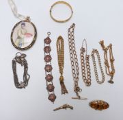 Large Victorian pinchbeck locket set with Chinese paintings, four rolled gold fob chains,