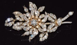 A c1915 gold floral trembler brooch set with diamonds, the largest approximately 0.25ct, 13.2g, 5.