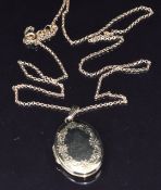 A 9ct gold locket on 9ct gold chain, 48cm long, 5.2g