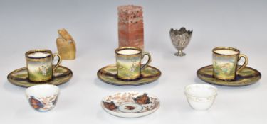 Three Japanese Meiji period Satsuma ware coffee cups and saucers with four character mark to base,