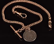 A 9ct rose gold watch chain / Albert with silver coin fob, 35g without silver coin, 40cm long