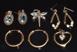 A 9ct gold pendant and three pairs of 9ct gold earrings, one pair set with topaz (3.1g) and a silver