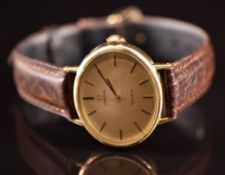 Omega ladies wristwatch ref. 511.417 with black hands, two-tone baton hour markers, gold dial,