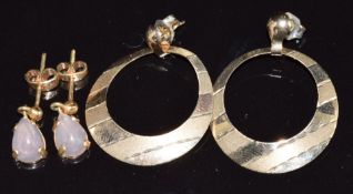 A pair of 18ct gold earrings set with jadeite (2.4g) and a pair of 9ct gold earrings, 1.5g