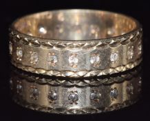 A 9ct gold eternity ring set with spinel, 3.9g, size P