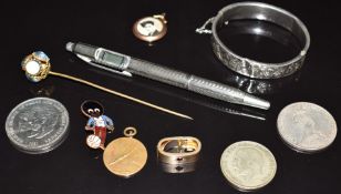 Victorian yellow metal scarf clip set with a ruby, 9ct gold locket, silver bangle, silver pen, coins