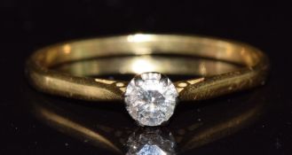 An 18ct gold ring set with a round cut diamond of approximately 0.25ct, 2.7g, size W