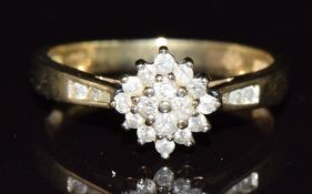 A 9ct gold ring set with a cluster of diamonds, 2.5g, size P