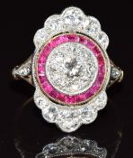 Art Deco 18ct gold ring set with diamonds and calibre cut rubies (head of ring 2 x 1.3cm), 3.7g,