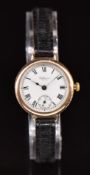 Waltham 9ct gold gentleman's wristwatch with inset subsidiary seconds dial, blued hands, black Roman