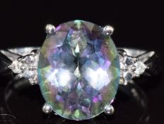 A 9ct white gold ring set with a topaz and diamonds, 4g, size N