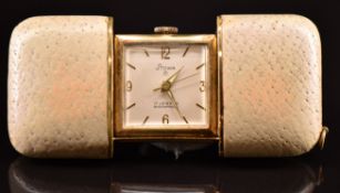 Stowa travel clock with 17 jewel movement, contained within a case having retractable ends, length