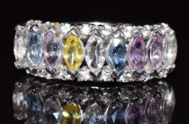 A 9ct white gold ring set with marquise cut pink, yellow, blue and white sapphires, 4.2g, size N