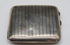 George V hallmarked silver cigarette case, Birmingham 1917, maker Henry Williamson Ltd, width 9cm,