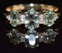 A 9ct gold ring set with sapphires and diamonds, 1.8g, size J