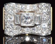 French Art Deco 18ct gold ring set with round and baguette cut diamonds, the largest approximately