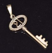A 9ct gold 21 key charm, 0.5g