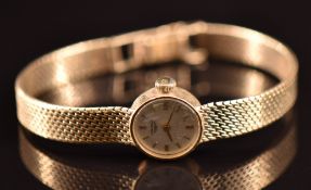 Longines 9ct gold ladies wristwatch ref. 60804 with gold hands and hour markers, silver dial,