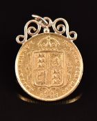 Queen Victoria 1887 gold half sovereign in mount, 4.4g