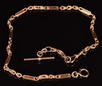 A 9ct gold watch chain with knotted and elongated interlocking links and T-bar, 42cm long, 29.6g