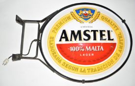Amstel Beer double sided advertising sign on wall bracket, 70 x 105cm
