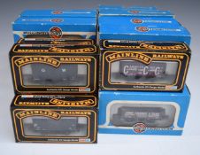 Twenty-eight Mainline and Airfix 00 gauge model railway goods wagons and vans, all in original