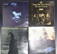 A collection of 35 albums including The Beatles, Fleetwood Mac, Bob Dylan, John Lennon, Eric Clapton